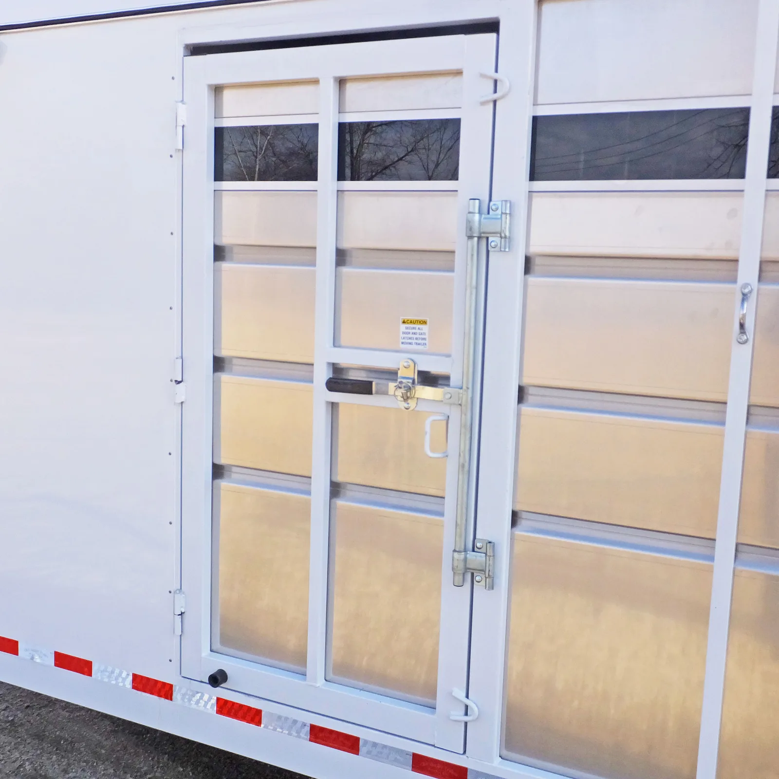 Maverick 4 horse gooseneck with optional escape door.